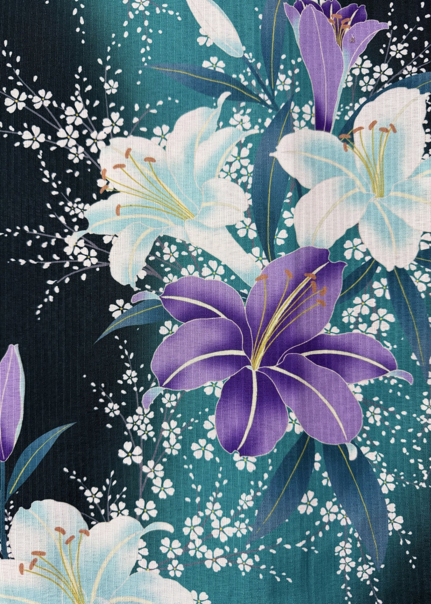 Floral pattern with purple and white lilies on a dark background