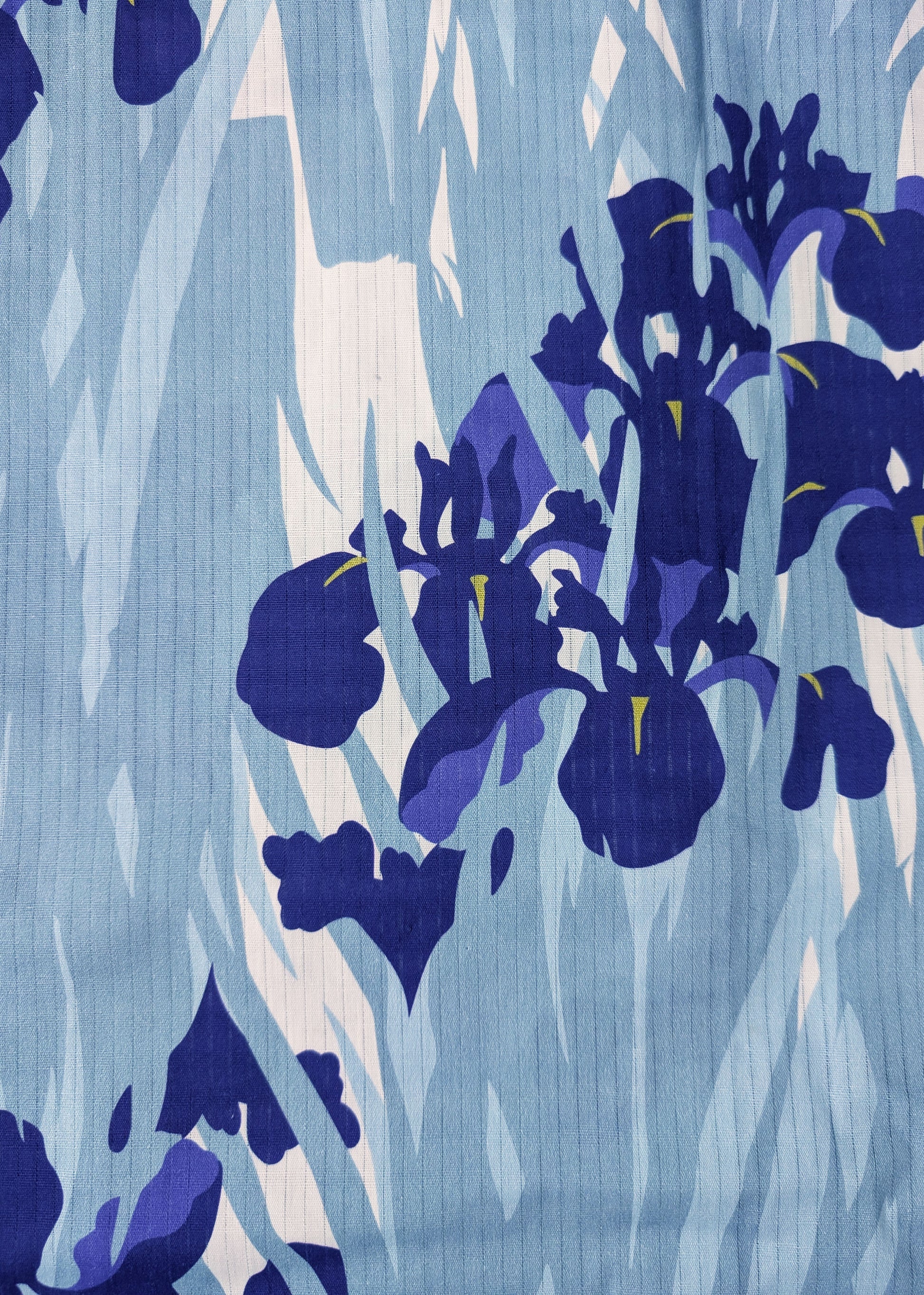 Fabric with blue floral pattern on a blue background
