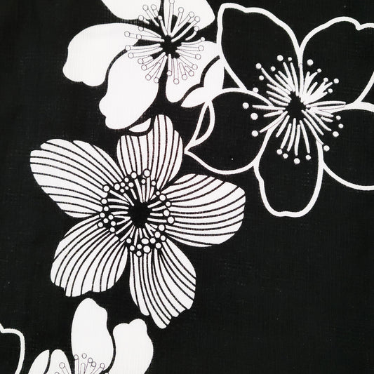 White cherry blossom against black Japanese yukata fabric