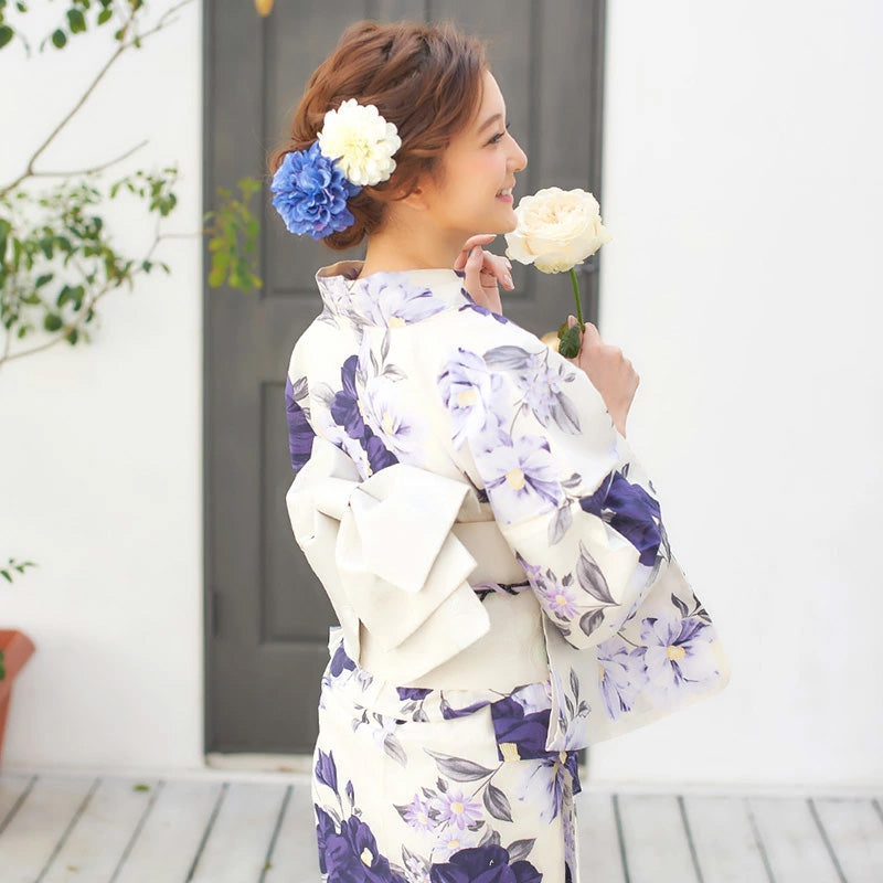 Woman wearing japanese yukata kimono in beige